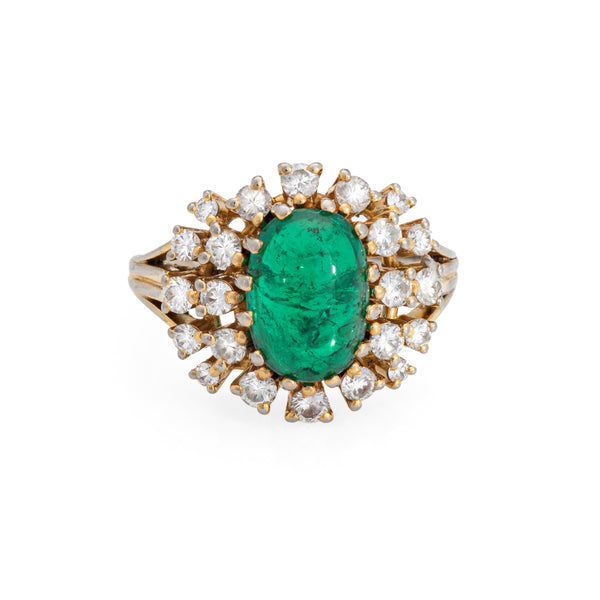 Vintage engagement ring with emerald and diamond