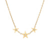 Cartier gold necklace with star-shaped, diamond pendants on a white background