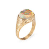 Victorian Gold ring with an opal stone on a white background